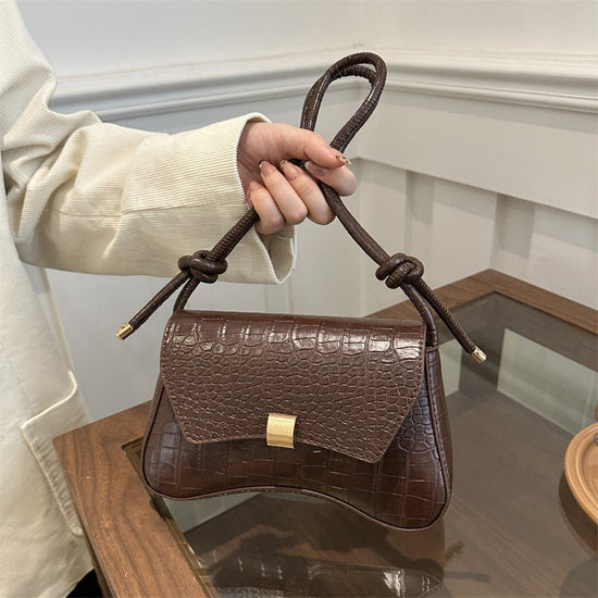 Trendy Retro Lock Simple Underarm Small Square Shoulder Bag $21.97 Dana Fashion Color: Black Women's Bags Product information: Lining texture: no lining Color: brown, black, red, white Outer bag type: clamshell bag Hardness: soft Material: PU Suitcase sha