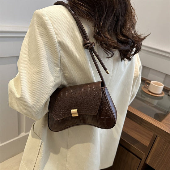 Trendy Retro Lock Simple Underarm Small Square Shoulder Bag $21.97 Dana Fashion Color: Black Women's Bags Product information: Lining texture: no lining Color: brown, black, red, white Outer bag type: clamshell bag Hardness: soft Material: PU Suitcase sha