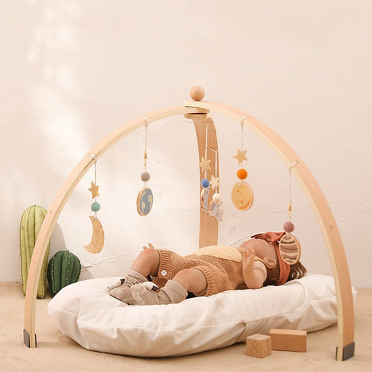 Triangle Rack Wooden Fitness Equipment Newborn Baby Crib Toy $384.64 Dana Fashion Color: Trianglefitnessframestar Baby & Mother Product information: Name: Triangle fitness frame + star pendant Material: Natural Basswood Packing list: Triangle fitness fram