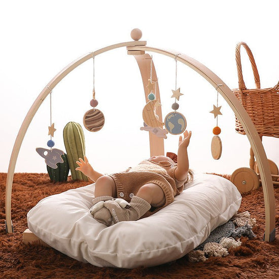 Triangle Rack Wooden Fitness Equipment Newborn Baby Crib Toy $384.64 Dana Fashion Color: Trianglefitnessframestar Baby & Mother Product information: Name: Triangle fitness frame + star pendant Material: Natural Basswood Packing list: Triangle fitness fram