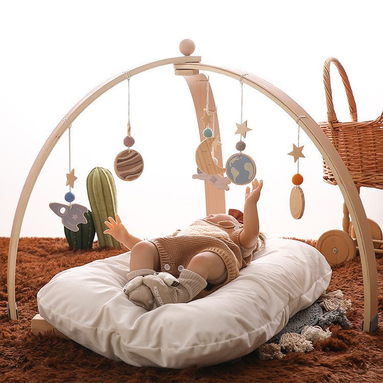 Triangle Rack Wooden Fitness Equipment Newborn Baby Crib Toy $384.64 Dana Fashion Color: Trianglefitnessframestar Baby & Mother Product information: Name: Triangle fitness frame + star pendant Material: Natural Basswood Packing list: Triangle fitness fram