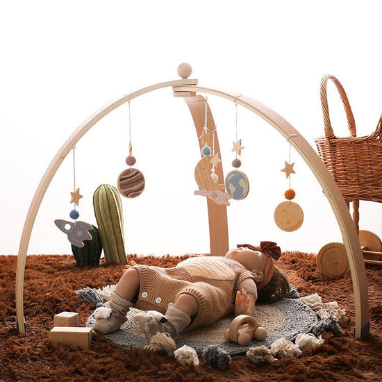Triangle Rack Wooden Fitness Equipment Newborn Baby Crib Toy $384.64 Dana Fashion Color: Trianglefitnessframestar Baby & Mother Product information: Name: Triangle fitness frame + star pendant Material: Natural Basswood Packing list: Triangle fitness fram
