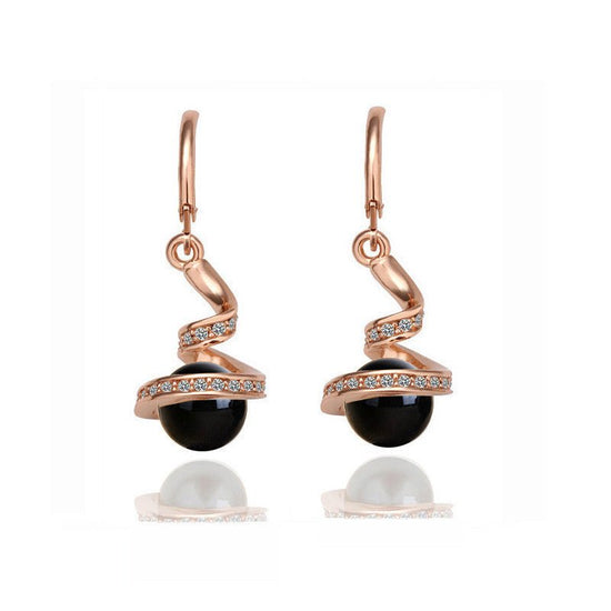 Twisted snake pearl $19.99 Dana Fashion Style: Earrings Color: Gold black Women's Accessories Material: Alloy
