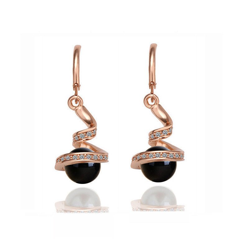 Twisted snake pearl $19.99 Dana Fashion Style: Earrings Color: Gold black Women's Accessories Material: Alloy