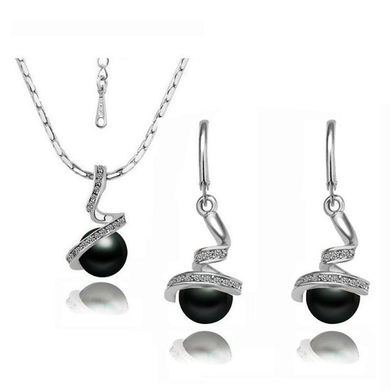 Twisted snake pearl $25.99 Dana Fashion Style: Suit Color: Silver black Women's Accessories Material: Alloy