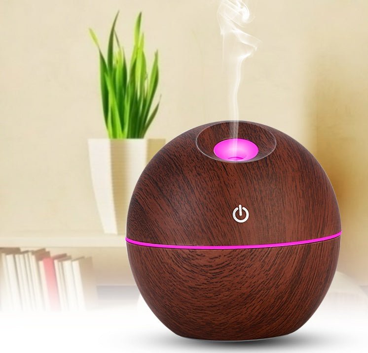 USB Aroma Essential Oil Ultrasonic Cold Steam Diffuser Air Humidifier Purifier 7 Color Change LED Night Light for Home Office $25.00 Dana Fashion Color: 1 Dark wood Beauty Tools Overview: Why you need this small USB Ultrasonic Humidifier? Make your home s