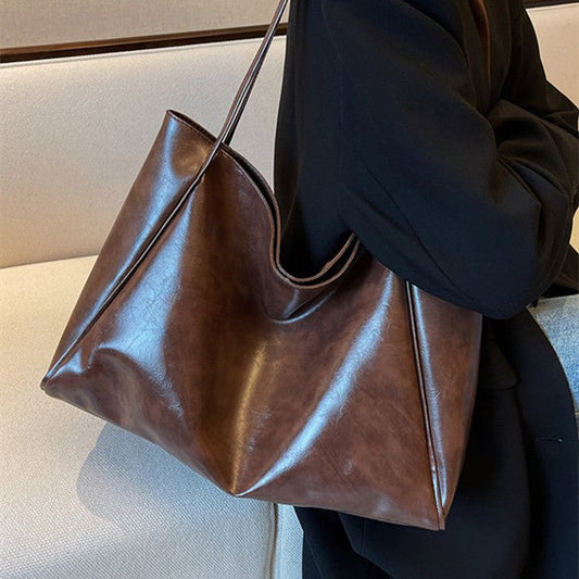 Vintage Shoulder Bags For Women Large Capacity Handbag Tote Bag $27.50 Dana Fashion Color: Black Women's Bags Product information: Material: PU Style: fashionable and simple Features: solid color Colour: white, red, blue, black, dark brown Size Informatio