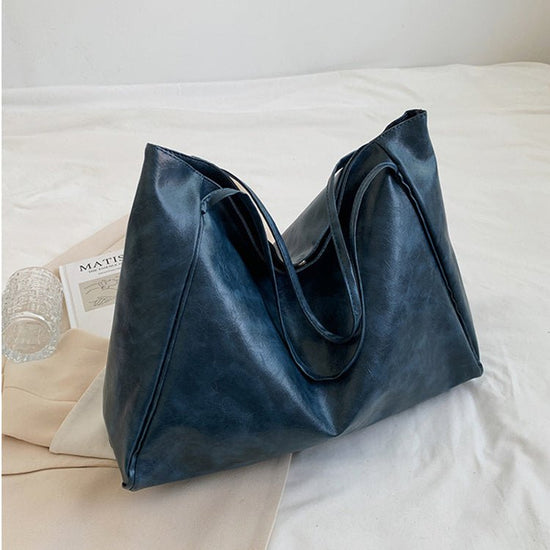 Vintage Shoulder Bags For Women Large Capacity Handbag Tote Bag $27.50 Dana Fashion Color: Black Women's Bags Product information: Material: PU Style: fashionable and simple Features: solid color Colour: white, red, blue, black, dark brown Size Informatio