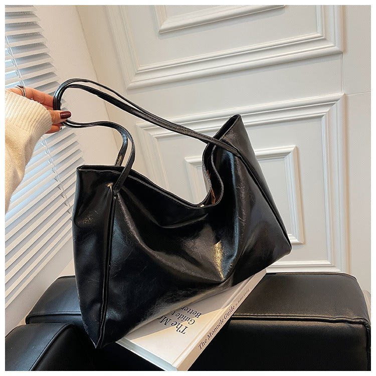 Vintage Shoulder Bags For Women Large Capacity Handbag Tote Bag $27.50 Dana Fashion Color: Black Women's Bags Product information: Material: PU Style: fashionable and simple Features: solid color Colour: white, red, blue, black, dark brown Size Informatio