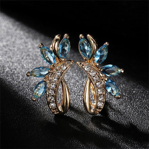 Water Drop Flower Shape Green Zircon Earrings $15.59 Dana Fashion Color: Champagne Gold Light Blue Women's Accessories Product information: Color: Champagne Gold Green, champagne gold purple, champagne gold sapphire blue, champagne gold light blue Materia