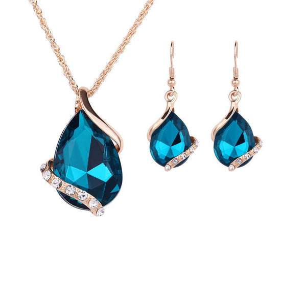 Water Drop Necklace Earring Set $25.00 Dana Fashion Color: Green Women's Accessories Style: European and American Material: Alloy Processing technology: Diamond Style: Women's Set combination: Earrings + item decorations Inlay material: White gold/K white