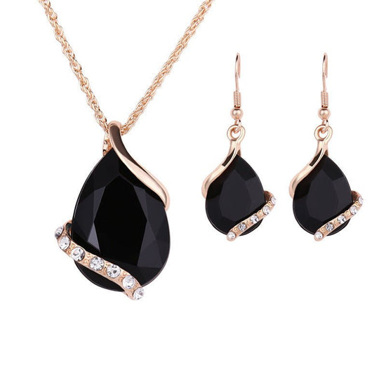 Water Drop Necklace Earring Set $25.00 Dana Fashion Color: Black Women's Accessories Style: European and American Material: Alloy Processing technology: Diamond Style: Women's Set combination: Earrings + item decorations Inlay material: White gold/K white