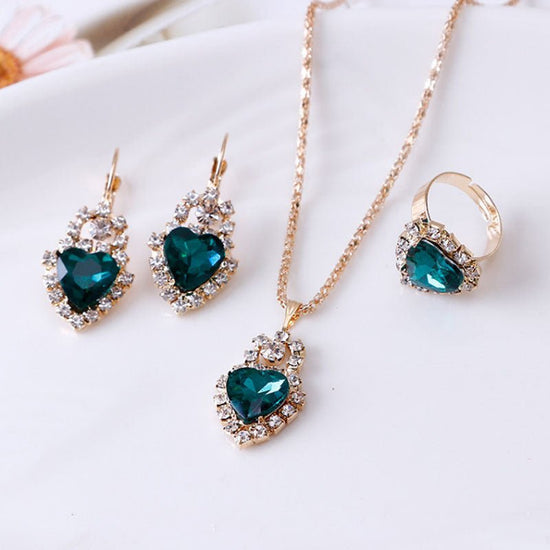 Water drop rhinestone necklace earrings ring set $22.99 Dana Fashion Color: Heart Green Women's Accessories Style: Europe and America Material: Alloy Processing technology: diamond Style: Women's Circumference: 43CM+extended chain 5CM