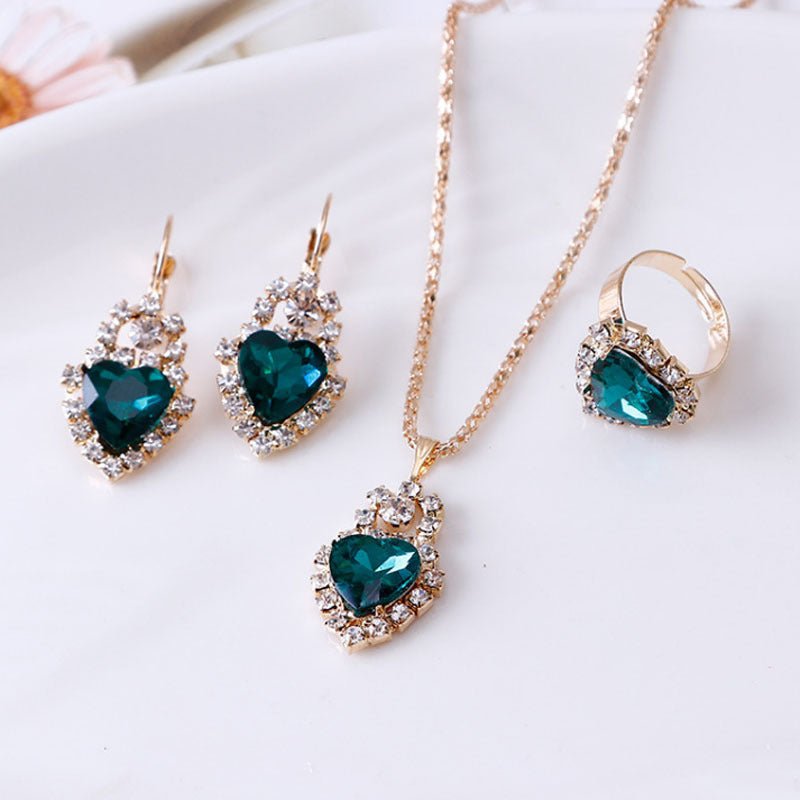 Water drop rhinestone necklace earrings ring set $22.99 Dana Fashion Color: Heart Green Women's Accessories Style: Europe and America Material: Alloy Processing technology: diamond Style: Women's Circumference: 43CM+extended chain 5CM