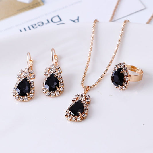 Water drop rhinestone necklace earrings ring set $22.99 Dana Fashion Color: Black Women's Accessories Style: Europe and America Material: Alloy Processing technology: diamond Style: Women's Circumference: 43CM+extended chain 5CM