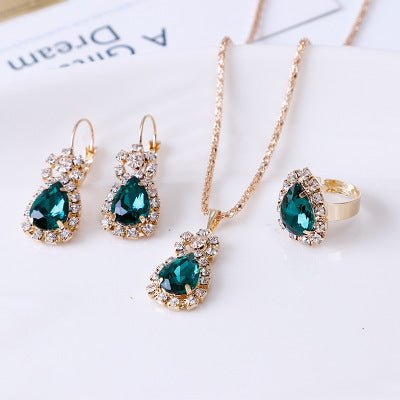 Water drop rhinestone necklace earrings ring set $22.99 Dana Fashion Color: Black Women's Accessories Style: Europe and America Material: Alloy Processing technology: diamond Style: Women's Circumference: 43CM+extended chain 5CM