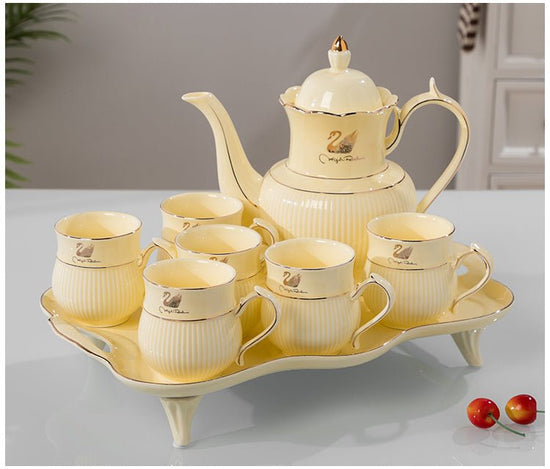 Water Set Ceramic Ware Household Light Luxury $125.99 Dana Fashion Color: Palace No. 2Yellow Swan Dana's Kitchen Product information: Material: Ceramic Plastic: PP Style: Nordic style Scope of application: beverages Craft: Glacier pattern Packing list: Ce