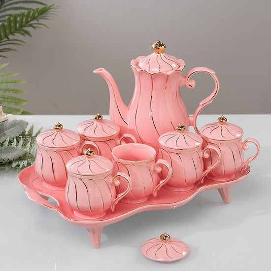 Water Set Ceramic Ware Household Light Luxury $125.99 Dana Fashion Color: Red flower fairy with lid Dana's Kitchen Product information: Material: Ceramic Plastic: PP Style: Nordic style Scope of application: beverages Craft: Glacier pattern Packing list: