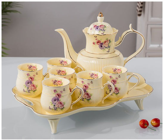 Water Set Ceramic Ware Household Light Luxury $125.99 Dana Fashion Color: Swan yellow plus feet Dana's Kitchen Product information: Material: Ceramic Plastic: PP Style: Nordic style Scope of application: beverages Craft: Glacier pattern Packing list: Cera