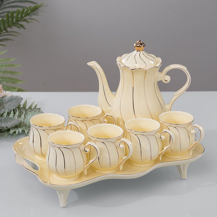 Water Set Ceramic Ware Household Light Luxury $125.99 Dana Fashion Color: Yellow Flower Fairy Dana's Kitchen Product information: Material: Ceramic Plastic: PP Style: Nordic style Scope of application: beverages Craft: Glacier pattern Packing list: Cerami