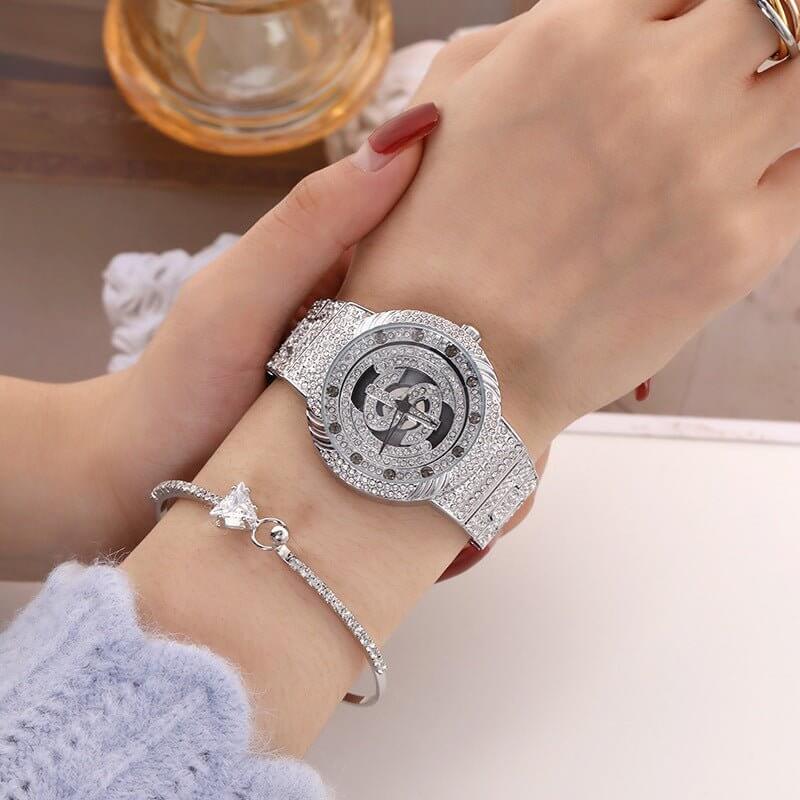 Waterproof Colorful Rotating Female Quartz Watch $55.50 Dana Fashion Color: Gold Women's Accessories Product information: Special function: decoration, diamond Display type: pointer + number Style: leisure Waterproof: Yes Waterproof performance: 10m Movem