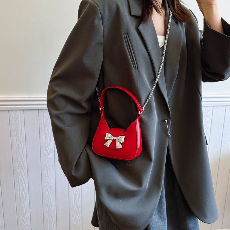 Western Style Niche Messenger Fashion Shoulder Underarm New Moon Bag $20.90 Dana Fashion Color: Beige Women's Bags Product information: Lining texture: synthetic leather Applicable scenario: Daily matching Color: black, silver, red, beige Outer bag type: