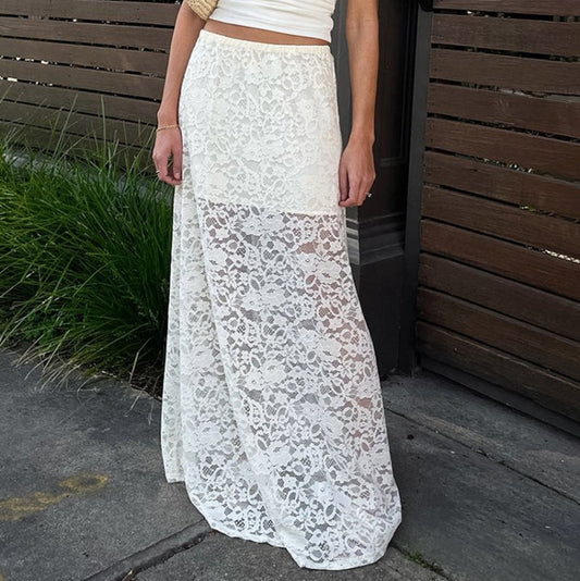 White Lace Hollow Out See-through Skirt $45.50 Dana Fashion Color: White Size: L Women's clothing Product information: Fabric name: Nylon Color: White Size: S,M,L Skirt length: long skirt Popular elements: hollow out Craft: collage/stitching (Unit: cm) Si