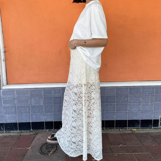 White Lace Hollow Out See-through Skirt $45.50 Dana Fashion Color: White Size: L Women's clothing Product information: Fabric name: Nylon Color: White Size: S,M,L Skirt length: long skirt Popular elements: hollow out Craft: collage/stitching (Unit: cm) Si