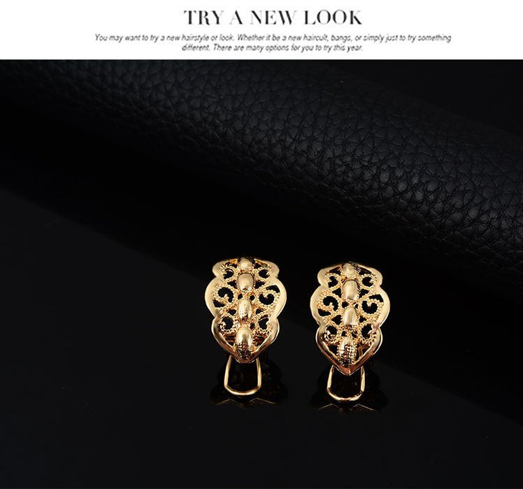 Wild style alloy necklace earrings $29.00 Dana Fashion Color: Gold Women's Accessories Style: Europe and America Material: Alloy Processing technology: diamond Style: Women's Set combination: earrings + item decoration + hand decoration Mosaic material: a