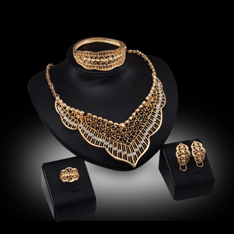Wild style alloy necklace earrings $29.00 Dana Fashion Color: Gold Women's Accessories Style: Europe and America Material: Alloy Processing technology: diamond Style: Women's Set combination: earrings + item decoration + hand decoration Mosaic material: a