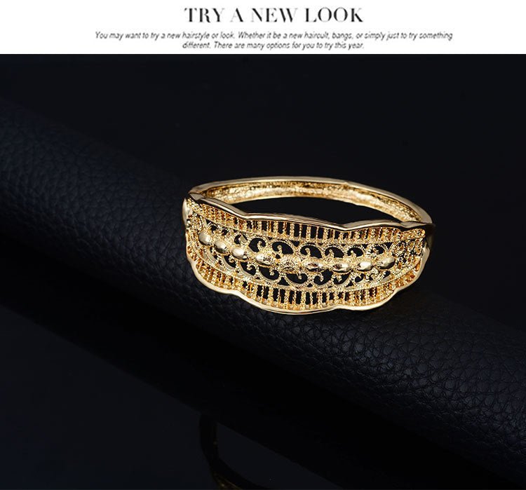 Wild style alloy necklace earrings $29.00 Dana Fashion Color: Gold Women's Accessories Style: Europe and America Material: Alloy Processing technology: diamond Style: Women's Set combination: earrings + item decoration + hand decoration Mosaic material: a