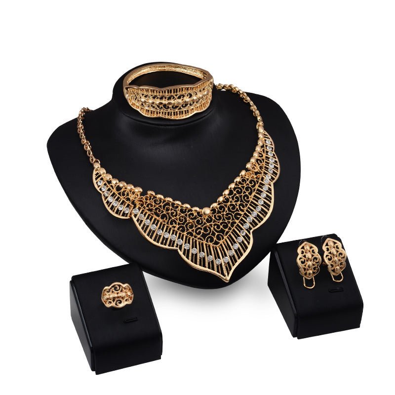 Wild style alloy necklace earrings $29.00 Dana Fashion Color: Gold Women's Accessories Style: Europe and America Material: Alloy Processing technology: diamond Style: Women's Set combination: earrings + item decoration + hand decoration Mosaic material: a