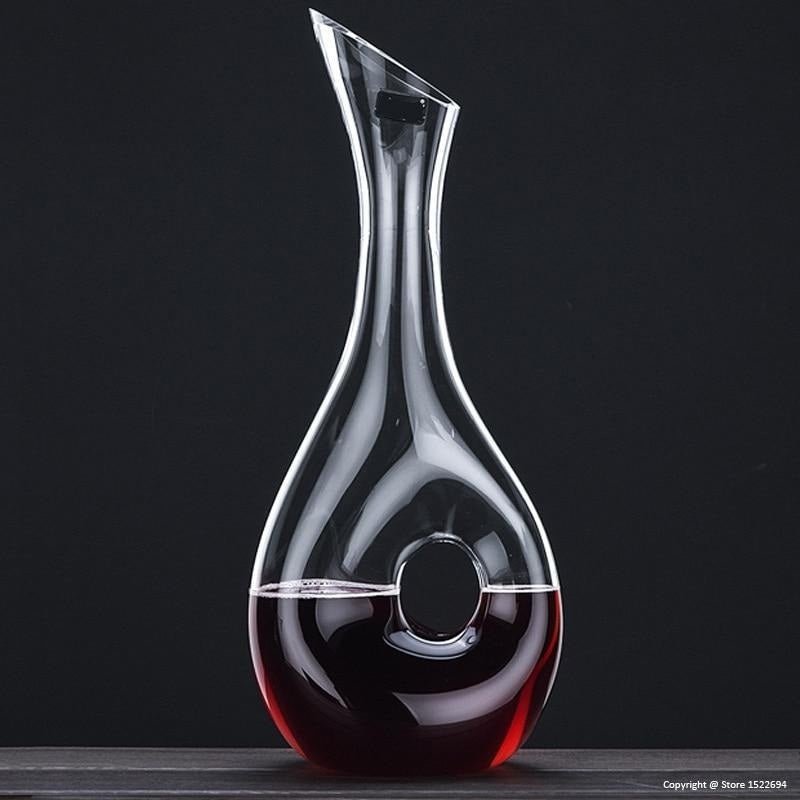 Wine Decanter Hip Flask Pourer Family Bar $81.27 Dana Fashion Color: 052 Dana's Kitchen Overview: High-end Large capacity red wine glasses decanter. Lead-free crystal glass material, health, safety. Cold incision process, fine workmanship. Specification:
