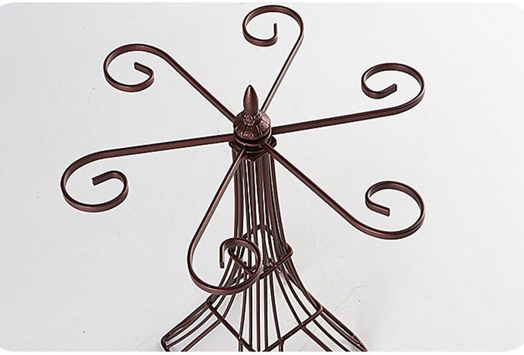 Wine glass holder $45.90 Dana Fashion Color: Bronze Dana's Kitchen Process material: iron, welding Size：26*15*33cm Trial scope: home, hotel, bar, etc. note: 1. Due to differences between different displays, the picture may not reflect the actual color of