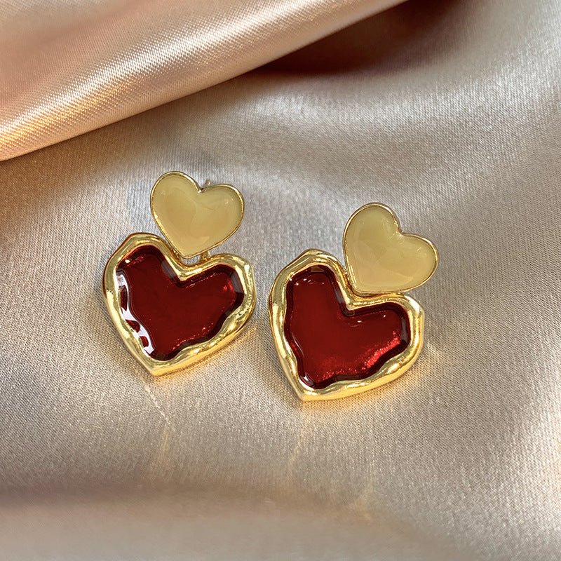 Wine Red Love Ear Ring Simple Elegance Retro Advanced $8.50 Dana Fashion Color: Gold Women's Accessories Product information: Color: Gold Material: Alloy Popular elements: water droplets Style: Korean style Packing list: Earrings x 1 pair Product Image: