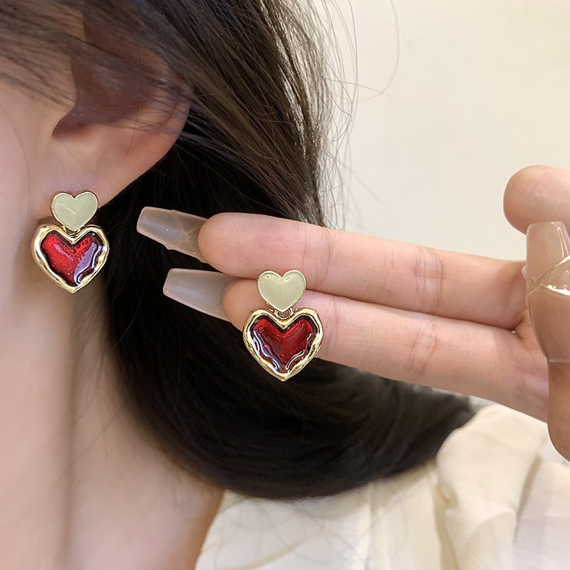 Wine Red Love Ear Ring Simple Elegance Retro Advanced $8.50 Dana Fashion Color: Gold Women's Accessories Product information: Color: Gold Material: Alloy Popular elements: water droplets Style: Korean style Packing list: Earrings x 1 pair Product Image: