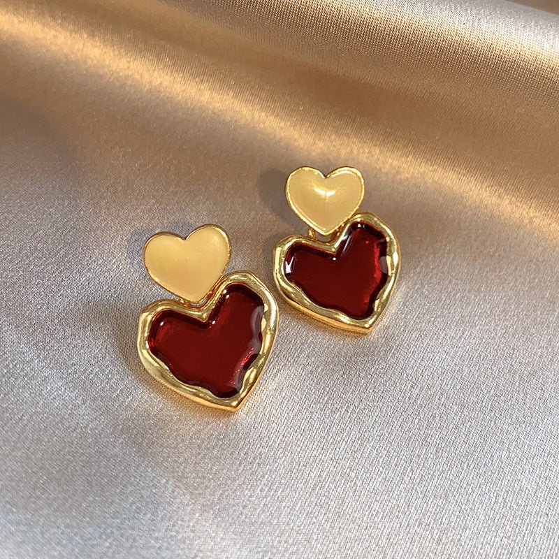 Wine Red Love Ear Ring Simple Elegance Retro Advanced $8.50 Dana Fashion Color: Gold Women's Accessories Product information: Color: Gold Material: Alloy Popular elements: water droplets Style: Korean style Packing list: Earrings x 1 pair Product Image: