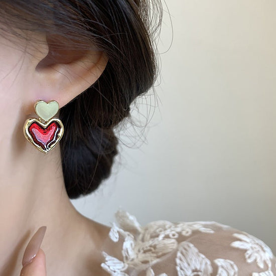 Wine Red Love Ear Ring Simple Elegance Retro Advanced $8.50 Dana Fashion Color: Gold Women's Accessories Product information: Color: Gold Material: Alloy Popular elements: water droplets Style: Korean style Packing list: Earrings x 1 pair Product Image: