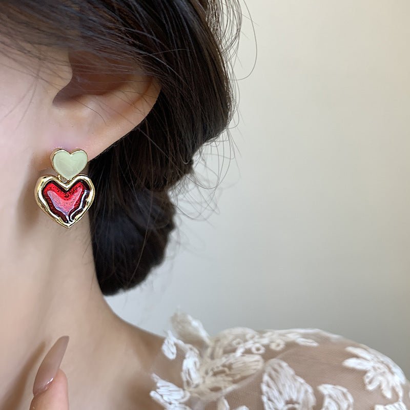 Wine Red Love Ear Ring Simple Elegance Retro Advanced $8.50 Dana Fashion Color: Gold Women's Accessories Product information: Color: Gold Material: Alloy Popular elements: water droplets Style: Korean style Packing list: Earrings x 1 pair Product Image: