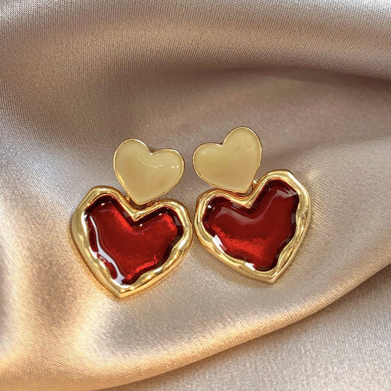 Wine Red Love Ear Ring Simple Elegance Retro Advanced $8.50 Dana Fashion Color: Gold Women's Accessories Product information: Color: Gold Material: Alloy Popular elements: water droplets Style: Korean style Packing list: Earrings x 1 pair Product Image: