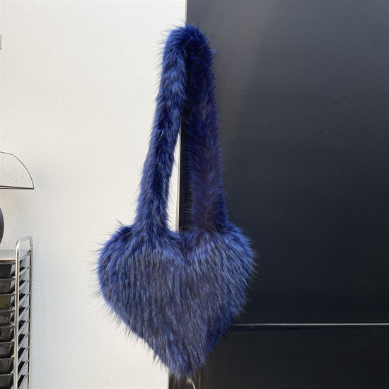 Winter Fleece Shoulder Bags Women Heart Shape Crossbody Bag Plush Large Capacity Love Bag $89.99 Dana Fashion Color: Purplish Blue Women's Bags Product information: Lining texture: Polyester Pattern: None Applicable scenarios: Daily matching Color: plain