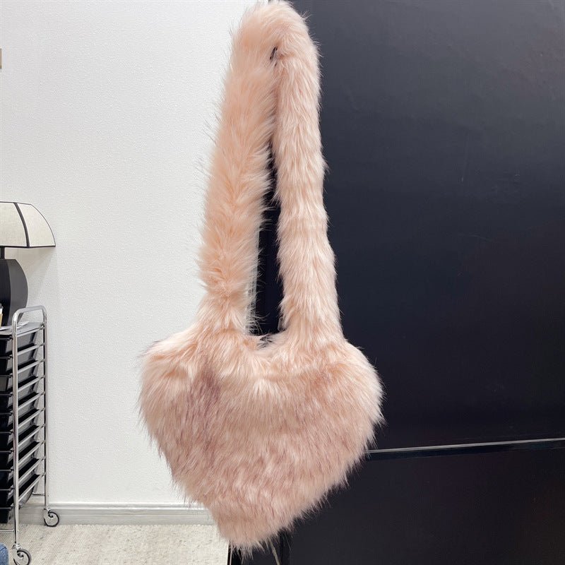 Winter Fleece Shoulder Bags Women Heart Shape Crossbody Bag Plush Large Capacity Love Bag $89.99 Dana Fashion Color: Meat Pink Women's Bags Product information: Lining texture: Polyester Pattern: None Applicable scenarios: Daily matching Color: plain colo