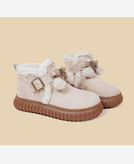 Winter Plush Thick Midsole Snow Boots $129.50 Dana Fashion Color: Apricot color Size: 35 Women's shoes Overview: Unique design, stylish and beautiful. Good material, comfortable feet. A variety of colors, any choice. Specification: Pattern: Solid color Sh