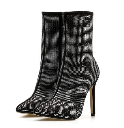 Women Pointed Toe Heeled Boots $69.50 Dana Fashion Color: Beige Size: 35 Women's shoes Upper material; suede Sole material; plastic Applicable gender; female Style; Europe and America Toe shape; pointed toe Heel shape; stiletto Heel height; super high hee