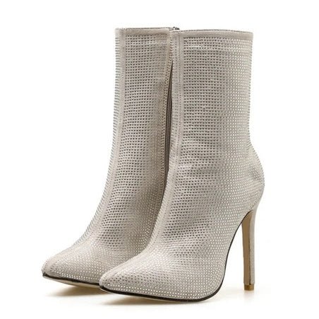 Women Pointed Toe Heeled Boots $69.50 Dana Fashion Color: Beige Size: 35 Women's shoes Upper material; suede Sole material; plastic Applicable gender; female Style; Europe and America Toe shape; pointed toe Heel shape; stiletto Heel height; super high hee