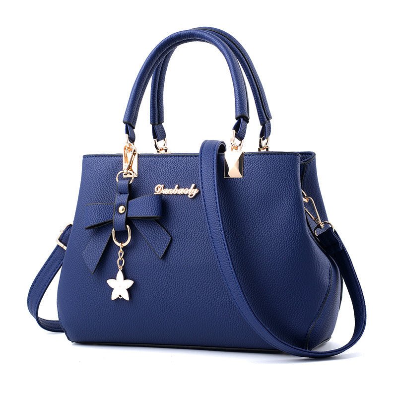 Women Shoulder Bag With Bowknot Star Pendant Totes $47.00 Dana Fashion Color: Dark blue Women's Bags Product information: Color: wine red, light gray, green, dark blue, black, oak pink, brown Style: urban simplicity Material: PU Luggage Trend Style: Kille