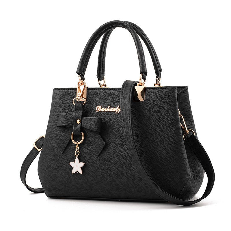 Women Shoulder Bag With Bowknot Star Pendant Totes $47.00 Dana Fashion Color: Black Women's Bags Product information: Color: wine red, light gray, green, dark blue, black, oak pink, brown Style: urban simplicity Material: PU Luggage Trend Style: Killer Ba