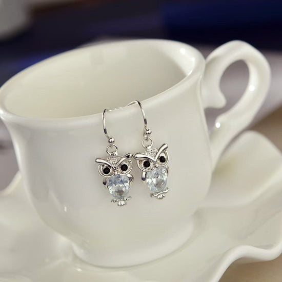 Women's Animal Stud Earrings Owl $8.99 Dana Fashion Color: Rose Gold White Diamond Women's Accessories Product information: Treatment Process: Electroplating Color: silver white diamond, silver purple diamond, rose gold White Diamond Applicable population