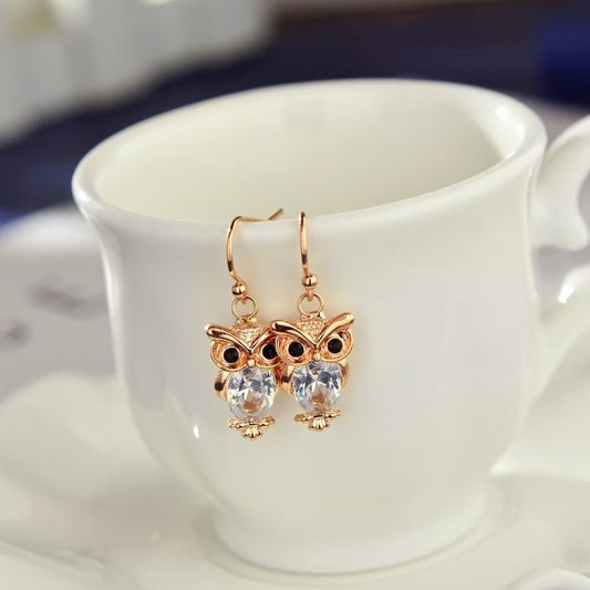 Women's Animal Stud Earrings Owl $8.99 Dana Fashion Color: Rose Gold White Diamond Women's Accessories Product information: Treatment Process: Electroplating Color: silver white diamond, silver purple diamond, rose gold White Diamond Applicable population