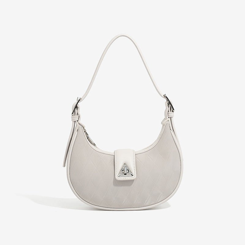 Women's Armpit Saddle Shoulder Messenger Bag $31.99 Dana Fashion Color: Beige Women's Bags Product information: Color: pink, black, Milky White Hardness: soft Material: PU Suitcase shape: Horizontal Square Number of shoulder straps: double connector Size: